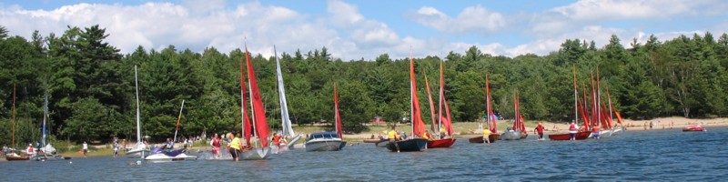 Photo: The Crew Run to Their Boats for the Start
Photographer: Janet Steel
File: JPEG 63 kB