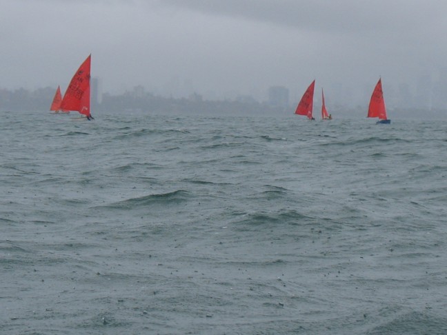 Photo: Running Down to the Finish in the Rain