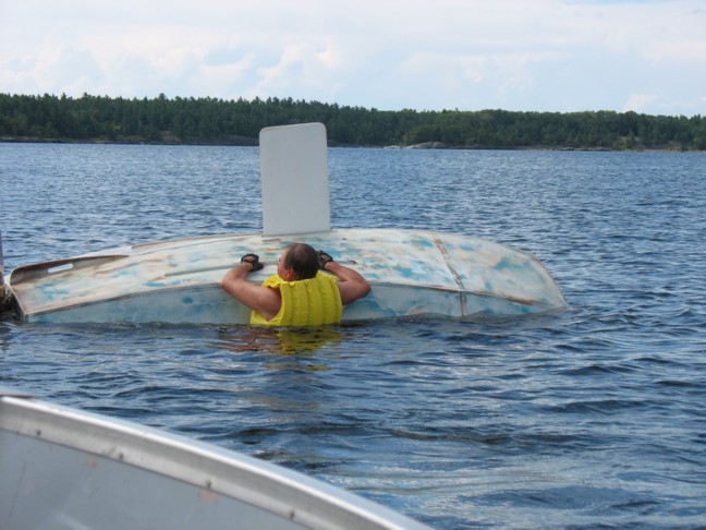 Photo: Les Pulls on the Centreboard to Right the Boat
Photographer: Stephen C. Steel