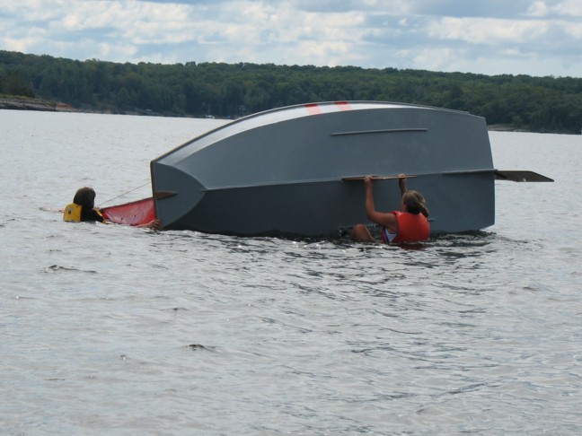 Photo: Shelley Pulls on the Centreboard to Right the Boat
Photographer: Stephen C. Steel