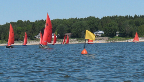 Photo: The Fleet Approaches The Windward Mark
Photographer: Peter Kaiser