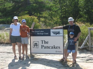 Photo: The Richardsons Pose with the Sign