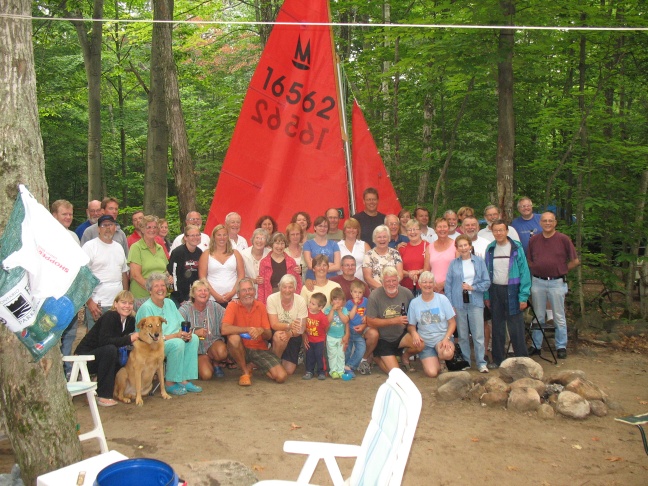 Photo: A Group Photo of the Gathering in Front of Pooh Stick