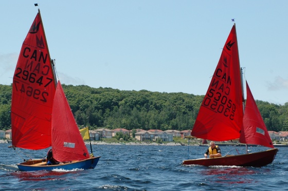 Photo: Steve Gets the Inside, and Sneaks Ahead of Mat and Mike Rounding the Mark