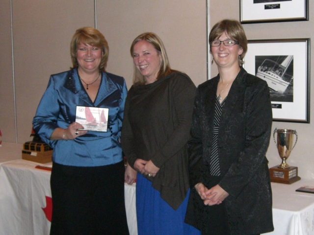 Photo: Heather Accepts her Plaque for the Derek Clay Regatta