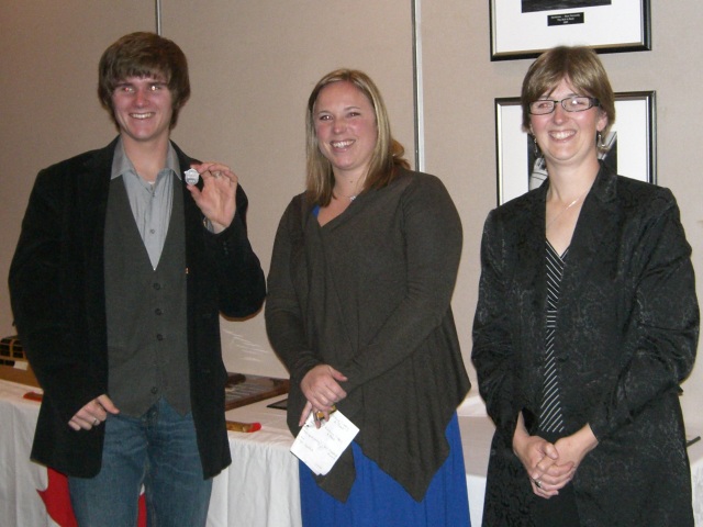 Photo: Mat Accepts a New Namplate for the Hands Across the Sea Trophy