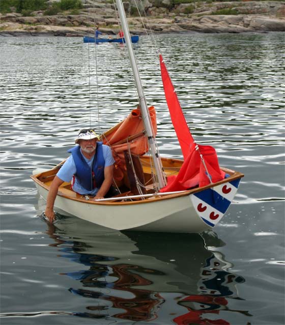 Photo: Aleid Paddles to Wim's Boat