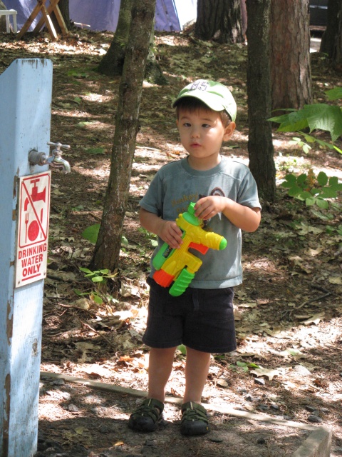 Photo: Kobi Filling his Watergun