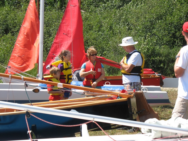 Photo: Carl Gives Some Sage Advice to his Daughter and Grandchildren