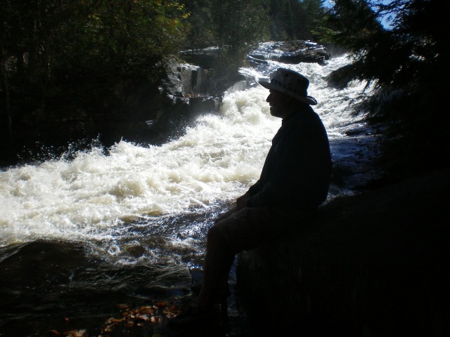 Photo: Aleid Sillouetted Against the Waterfall