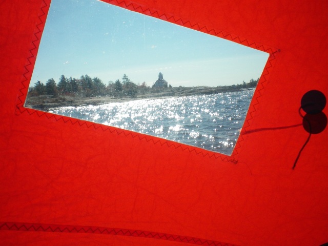 Photo: View of Lighthouse Near Sandy Island through the Jib Window