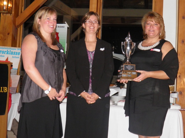 Photo: Heather accepting the Cherry Beach Challenge trophy