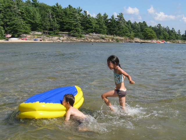 Photo: Tianna and Kairo Playing in the Water