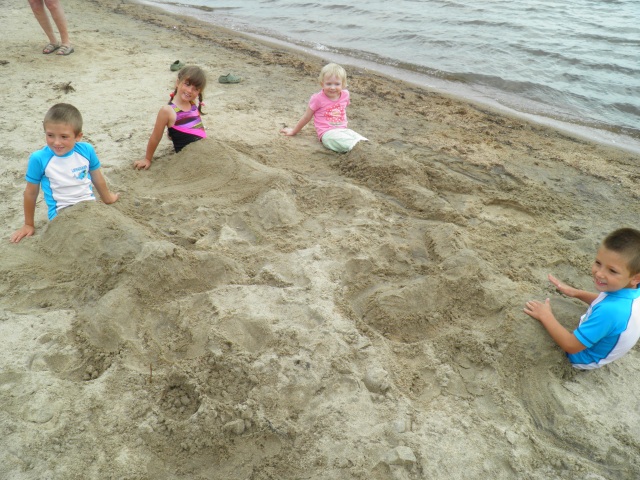 Photo: The Kids Enjoy the Sand