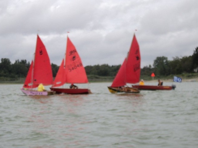 Photo: John, Paul and Marika Cross the Start Line