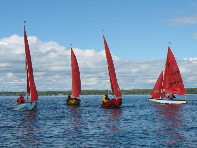 Photo: It's a Tight Group Heading Back Towards the Committee Boat