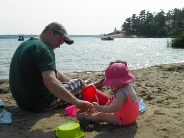 Photo: Kevin Imparts Some of His Sand Castle Expertise to Meghan