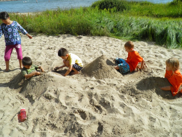 Photo: Burying Your Friend in the Sand is a Perennial Favourite