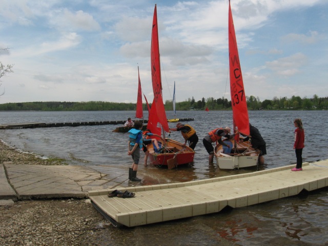 Photo: Tayja Climbs in While Marika and Wyatt Head Out in the Background