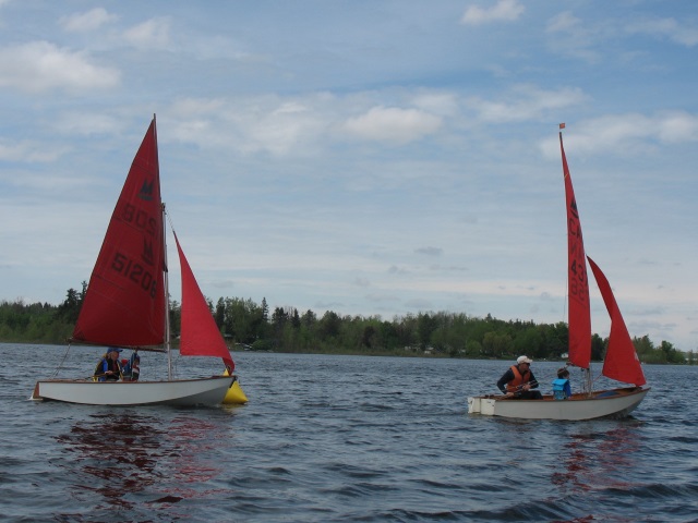 Photo: Dawn Rounds the Gybe Mark Behind Erik