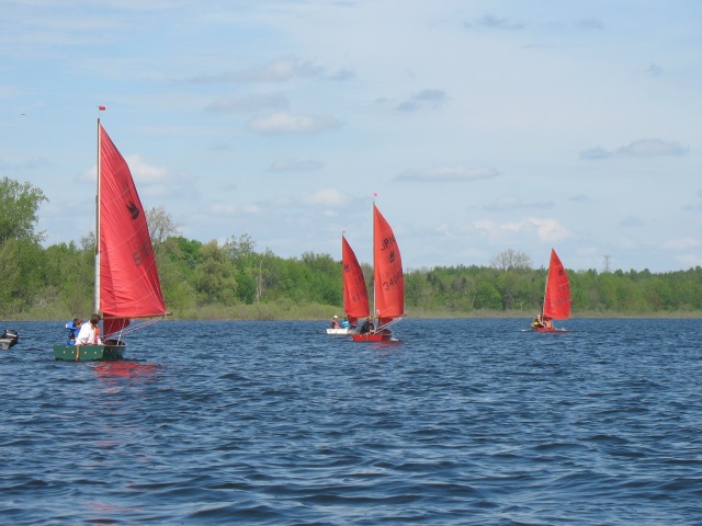 Photo: Looking through the finish line as the fleet heads to the leeward mark